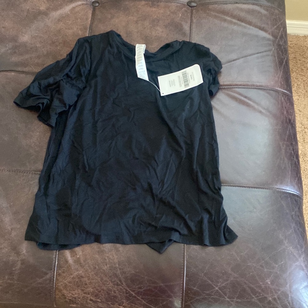 Brand new with tags, black Fabletics t-shirt, size XS